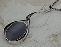 NEAPOL - srebrny wisior z kocim okiem